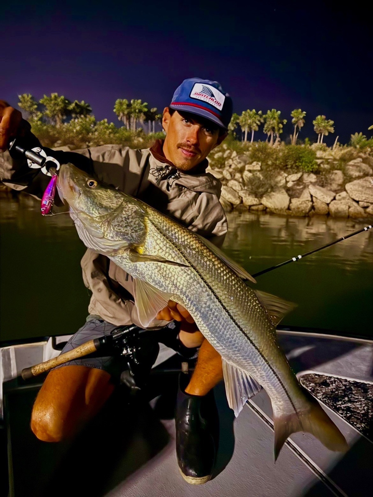 Capt. Trevor Kucia with a snook caught at night